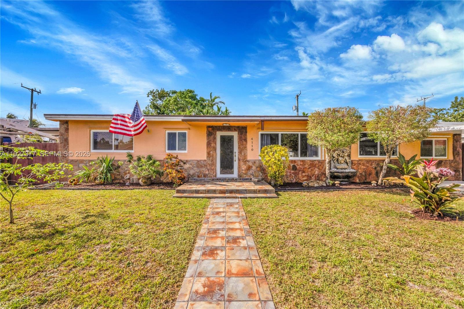 4110 West 7th Lane Hialeah, FL 33012 - Photo 21 of 22 a front view of a house with swimming pool