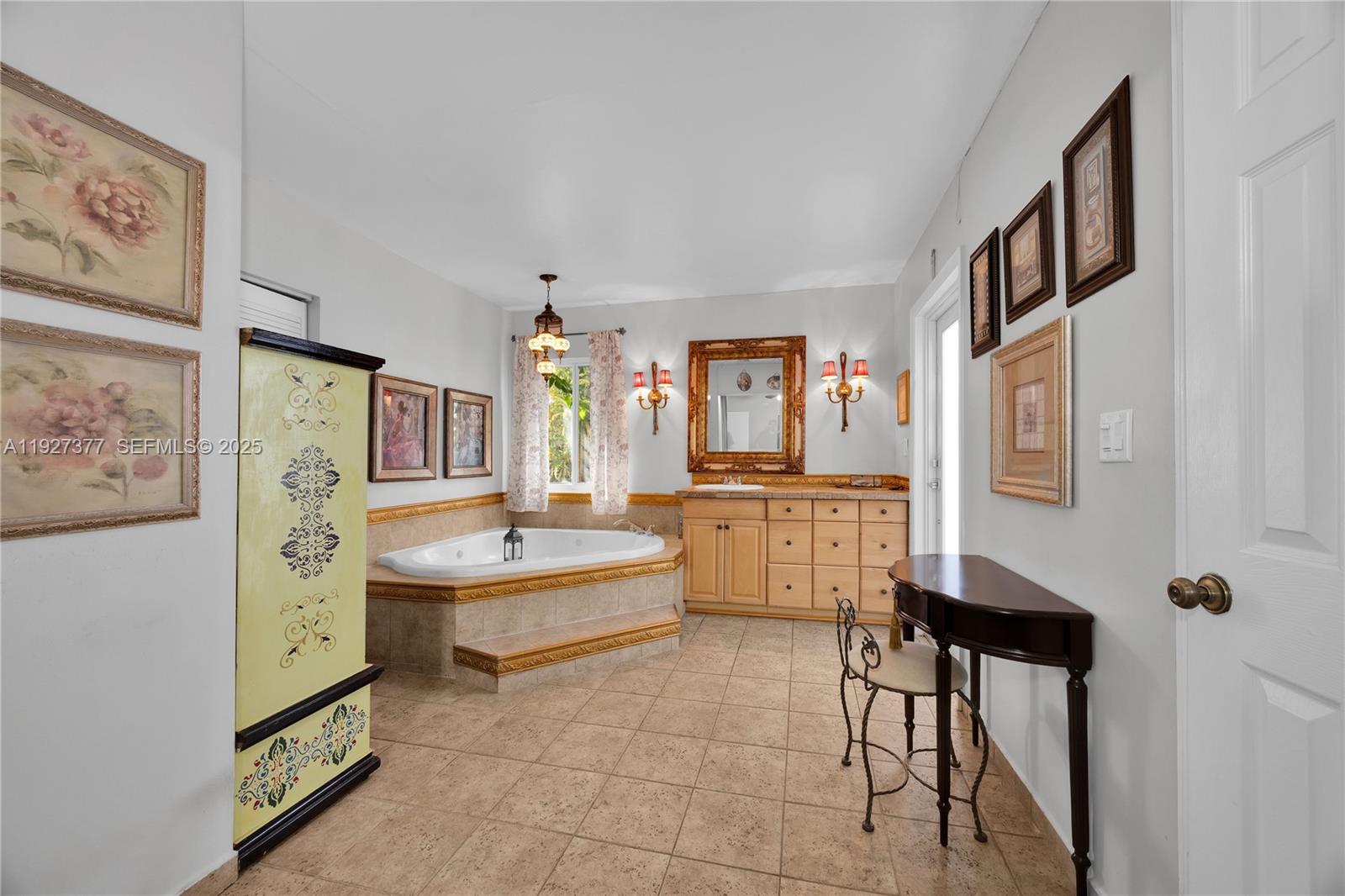 4110 West 7th Lane Hialeah, FL 33012 - Photo 9 of 24 a room with cabinets and furniture