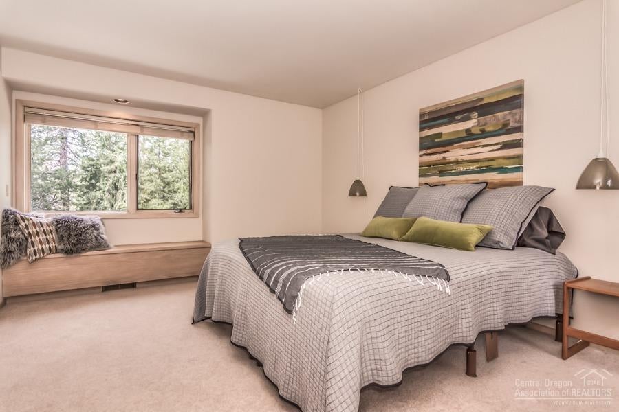 18035 North Course Lane Sunriver, OR 97707 - Photo 19 of 25 The first of several guest rooms, two of which have walk-in closets and window seats.