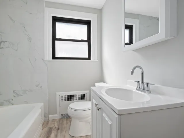 a bathroom with a sink and a toilet