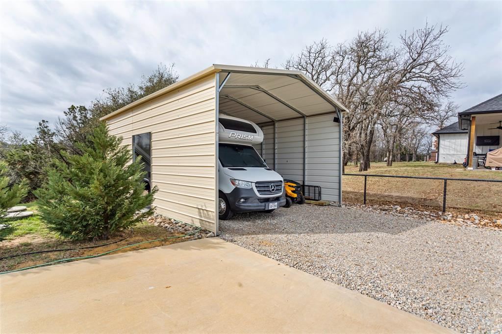 223 Cottongame Road Weatherford, TX 76088 - Photo 34 of 39 a view of a car park in front of house