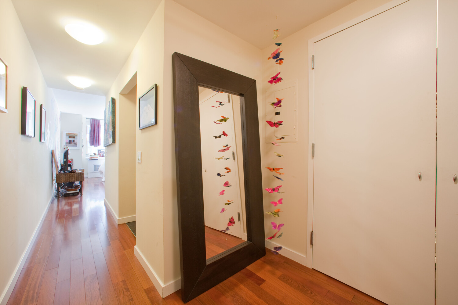 121 East 23rd Street, Unit 5F Manhattan, NY 10010 - Photo 3 of 6 a view of hallway with wooden floor