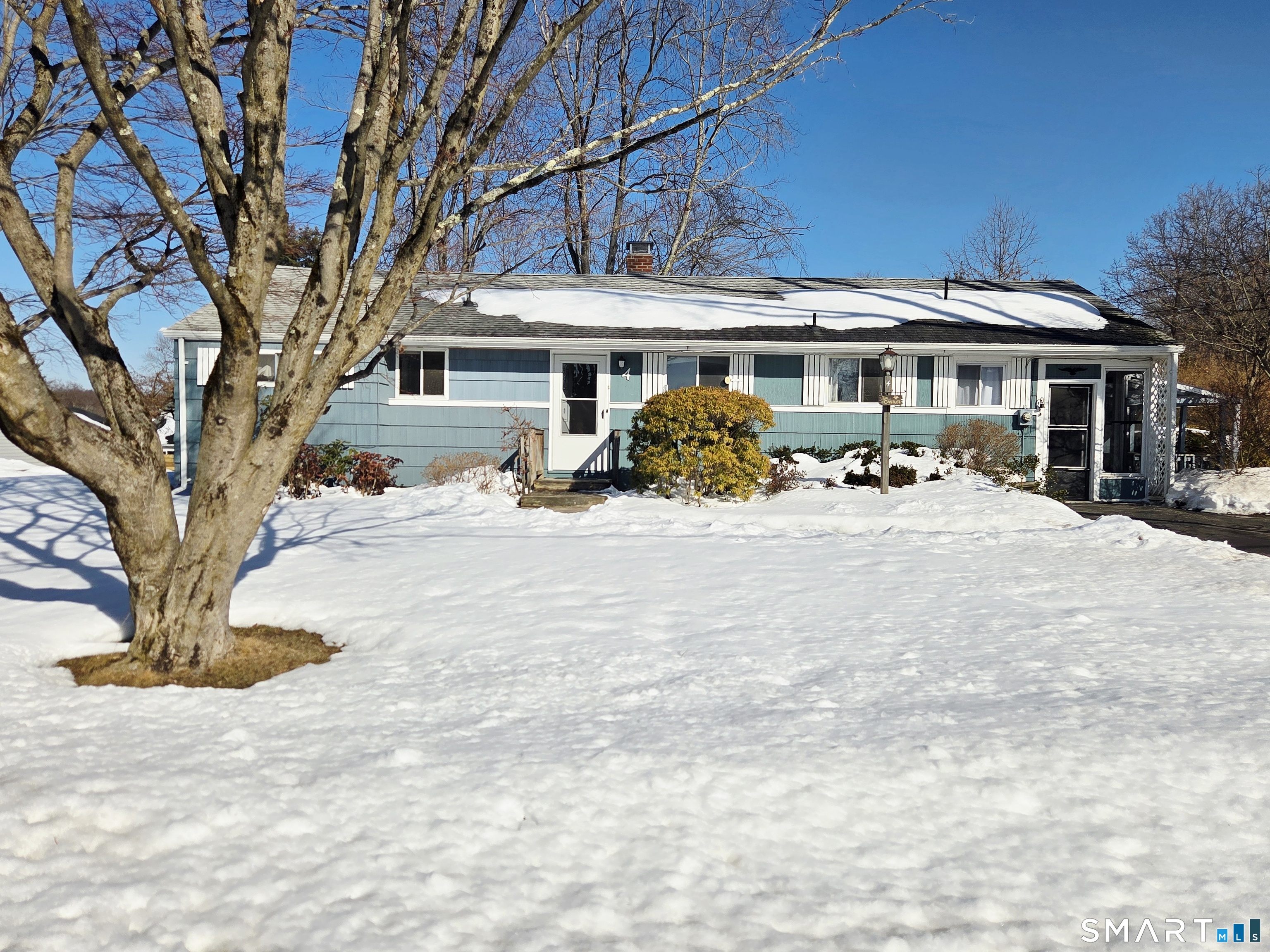 4 Lewis Street Simsbury, CT 06081 - Photo 2 of 30 a view of a house with a yard