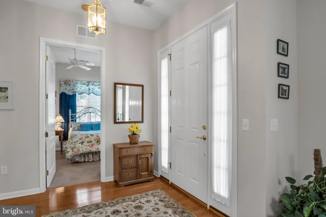 a en suite bathroom with a sink and a mirror