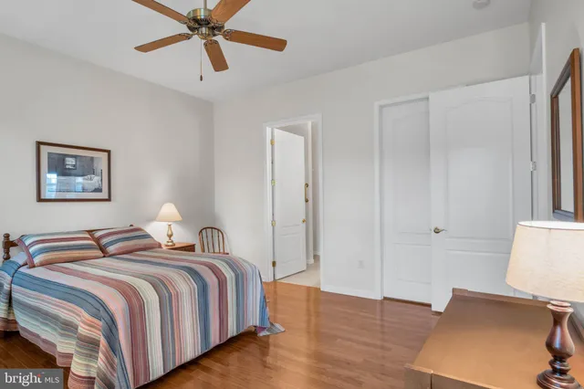 a bedroom with bed and window