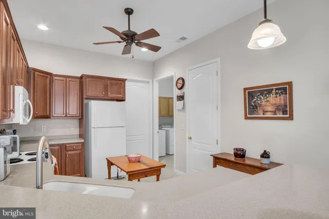 a room with furniture and a chandelier