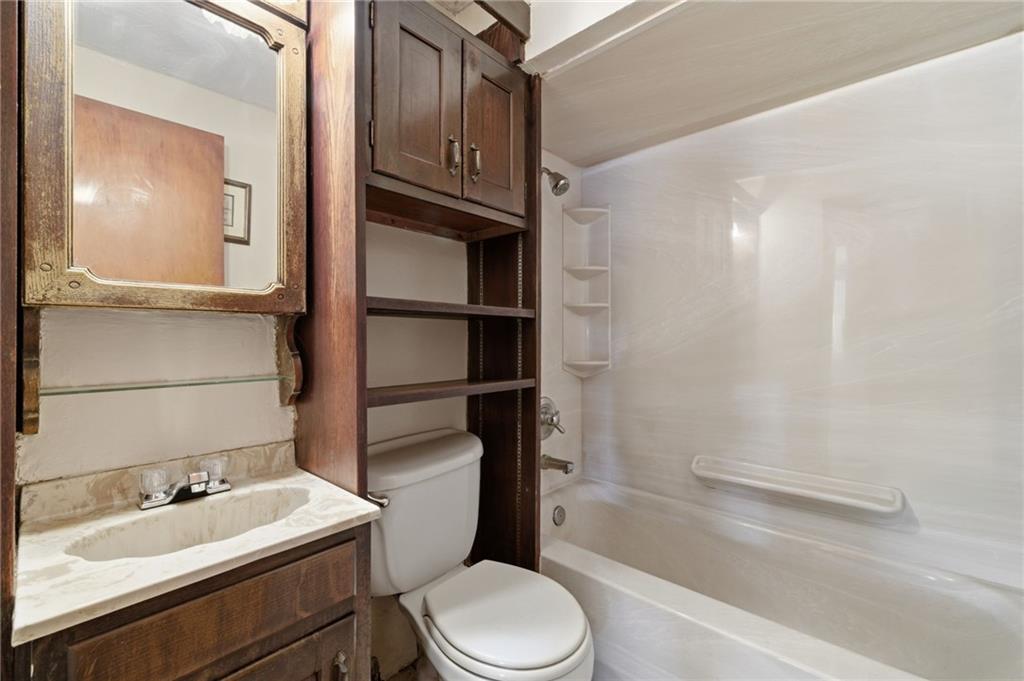 1368 Cathell Road Pittsburgh, PA 15236 - Photo 17 of 28 a bathroom with a sink a toilet and shower