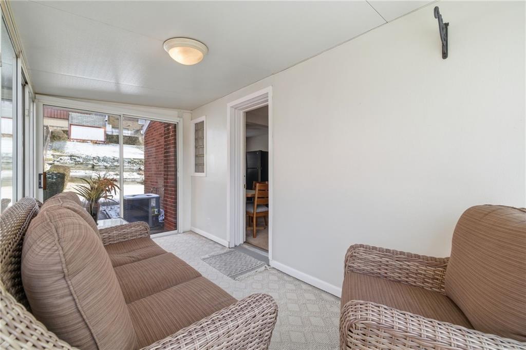 1368 Cathell Road Pittsburgh, PA 15236 - Photo 21 of 28 a living room with furniture and a window