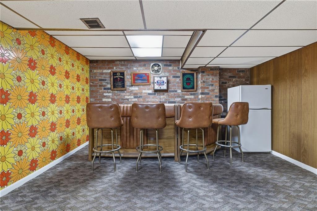 1368 Cathell Road Pittsburgh, PA 15236 - Photo 24 of 28 a view of a room with furniture and a chandelier