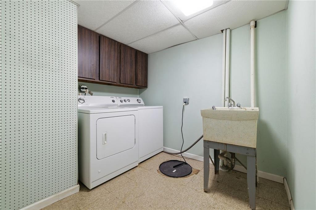 1368 Cathell Road Pittsburgh, PA 15236 - Photo 25 of 28 a utility room with dryer and washer