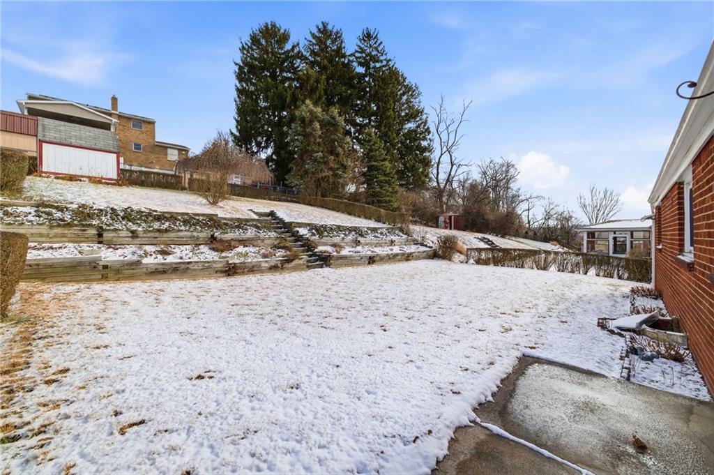 1368 Cathell Road Pittsburgh, PA 15236 - Photo 26 of 28 a view of a dry yard with wooden fence