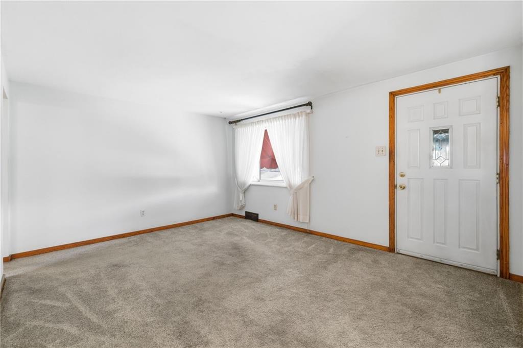 1368 Cathell Road Pittsburgh, PA 15236 - Photo 6 of 28 an empty room with windows