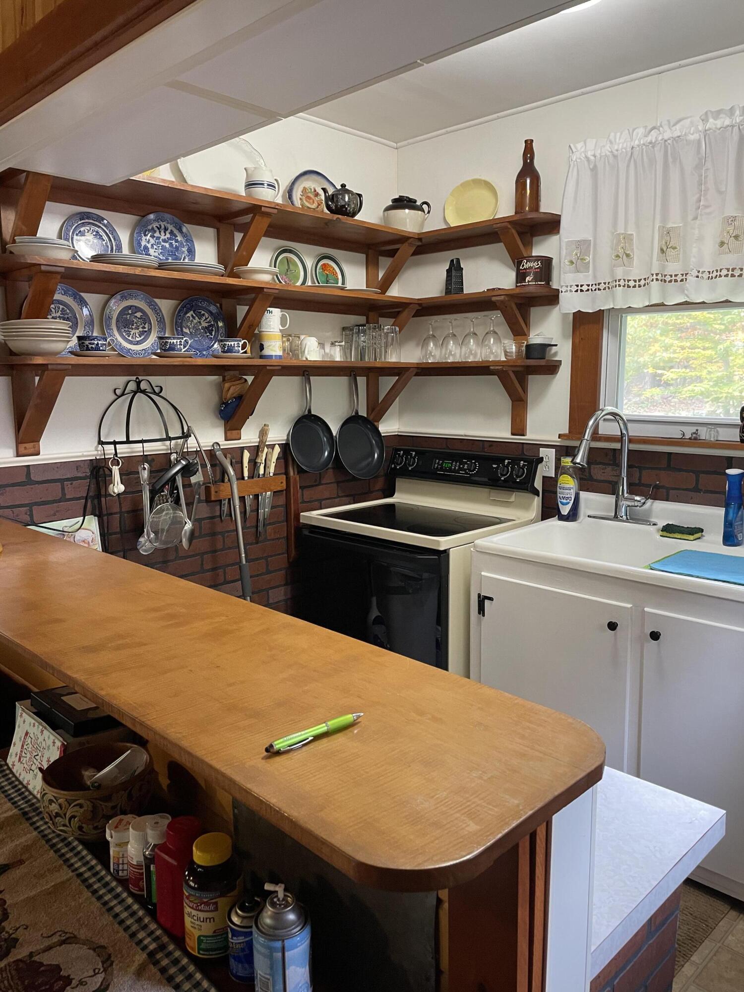 145 Orchard Road Sebago, ME 04029 - Photo 14 of 25 Compact , efficient kitchen