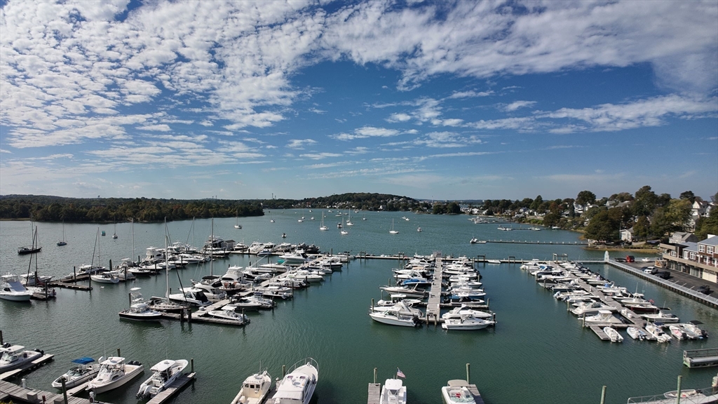 51 Broad Reach, Unit M65A Weymouth, MA 02191 - Photo 11 of 16 an aerial view of a houses with ocean view
