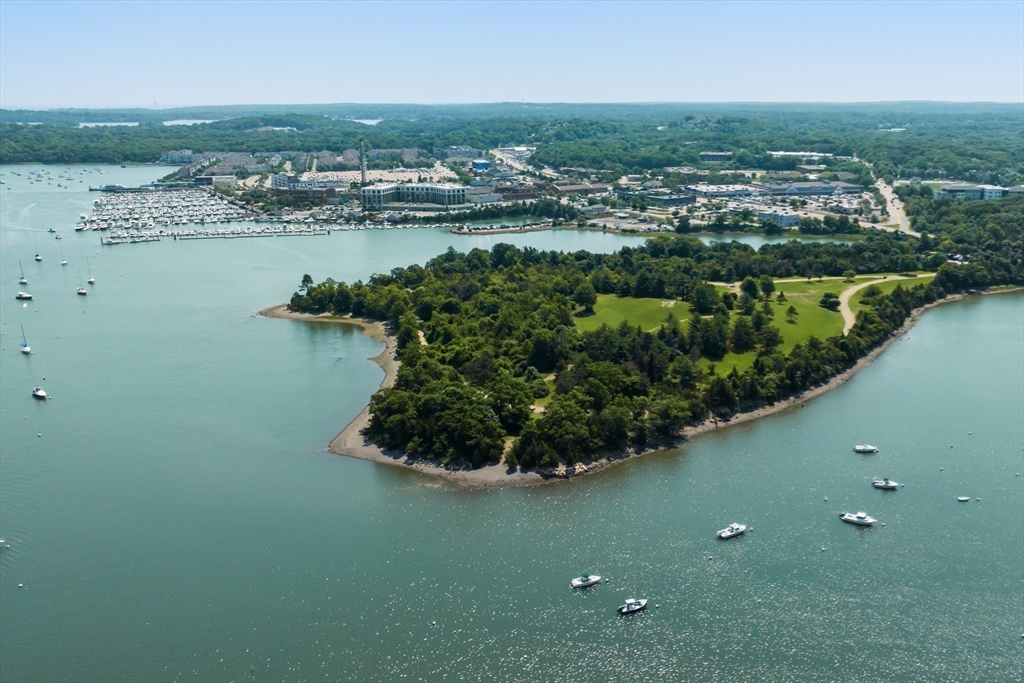 51 Broad Reach, Unit M65A Weymouth, MA 02191 - Photo 15 of 16 a view of a lake with a city