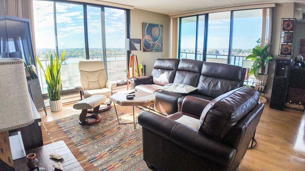 51 Broad Reach, Unit M65A Weymouth, MA 02191 - Photo 3 of 16 a living room with furniture and a large window