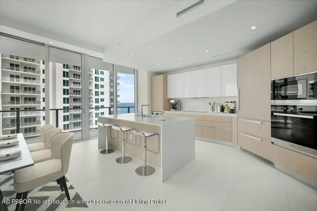 a kitchen with counter top space cabinets and stainless steel appliances