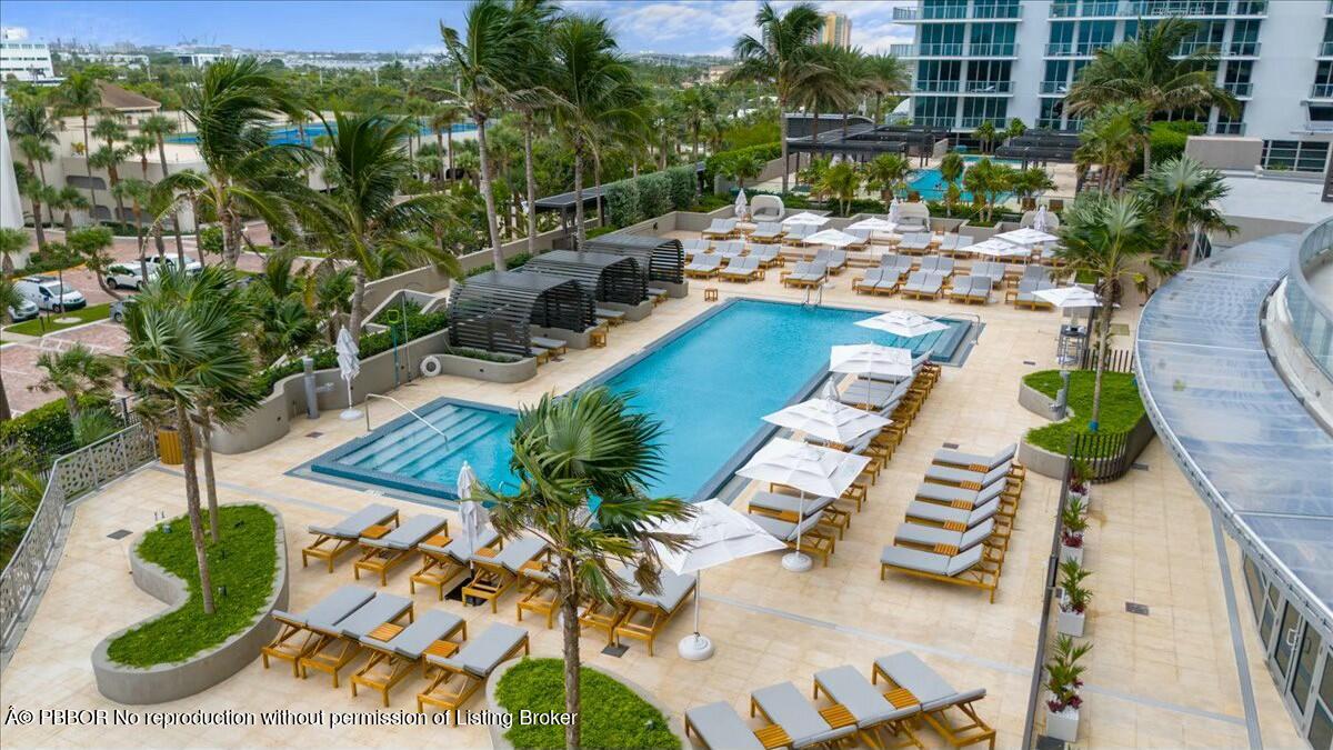 3100 North Ocean Drive, Unit H1009 Singer Island, FL 33404 - Photo 7 of 14 a view of yard from deck having patio