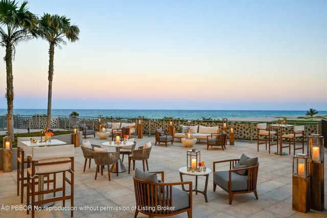 a view of a terrace with seating area