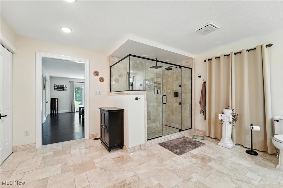 2930 South Ridge Road East Kingsville, OH 44048 - Photo 23 of 49 Bathroom with a stall shower and marble finish floors