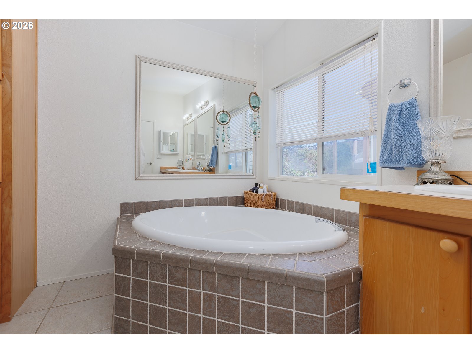 2018 Northwest Oceanic Loop Waldport, OR 97394 - Photo 19 of 35 a bathroom with a sink a toilet and a mirror
