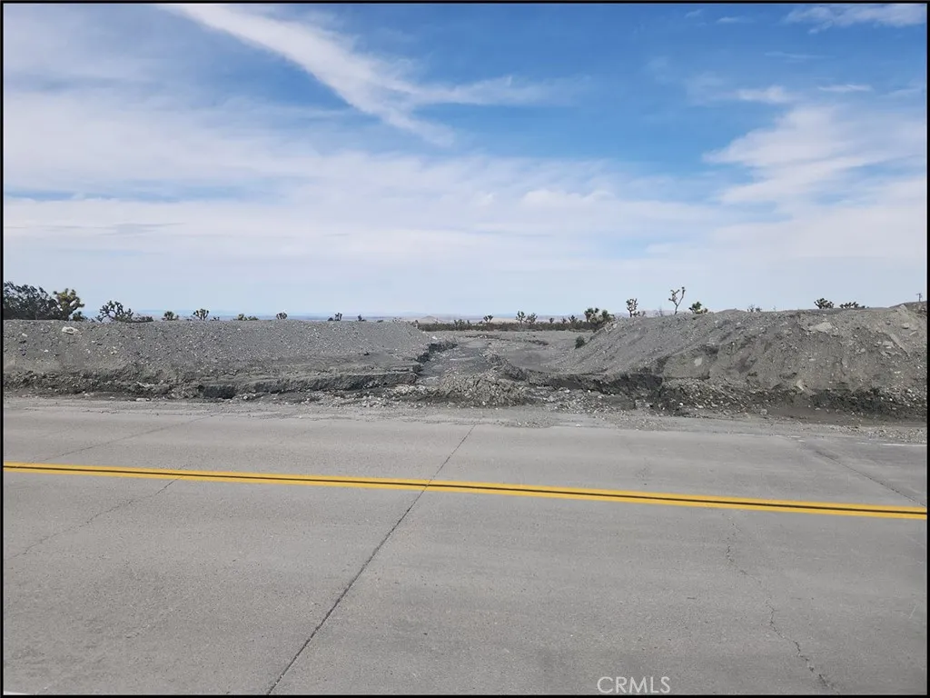 0 Duncan Road Pinon Hills, CA 92372 - Photo 10 of 11 a view of a lake and mountains in the background