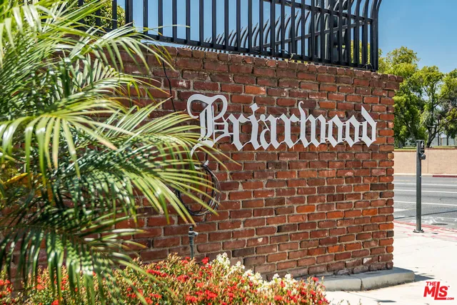 a sign that is on the side of a building