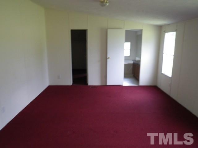273 Massengill Pond Road Angier, NC 27501 - Photo 6 of 6 a view of empty room with window