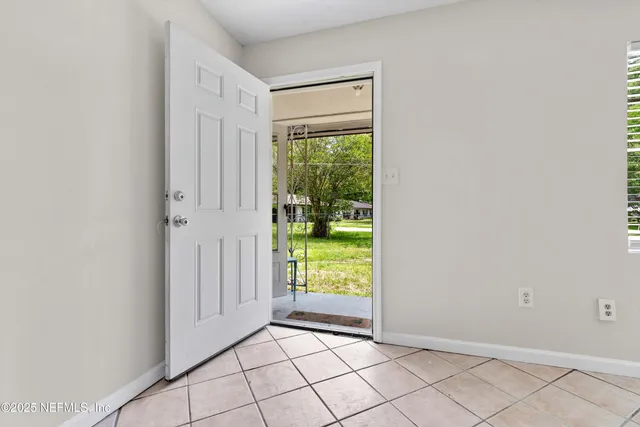 a view of an empty room with window