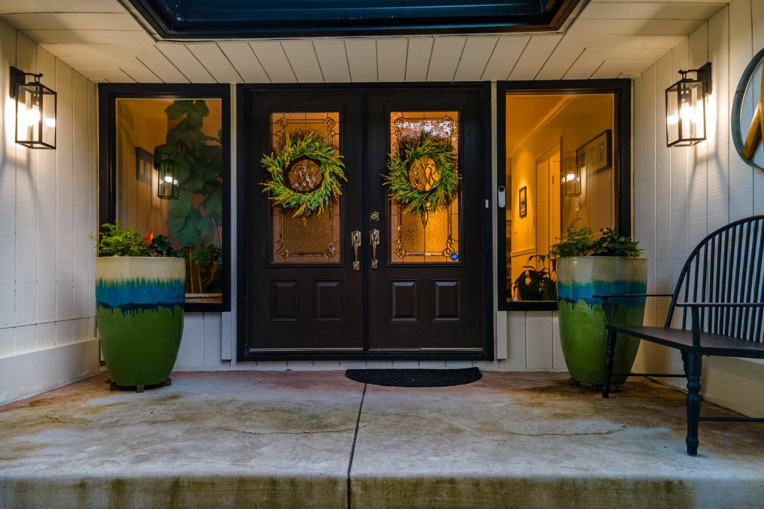 14975 Lago Drive Rancho Murieta, CA 95683 - Photo 2 of 41 a front view of a house with a porch