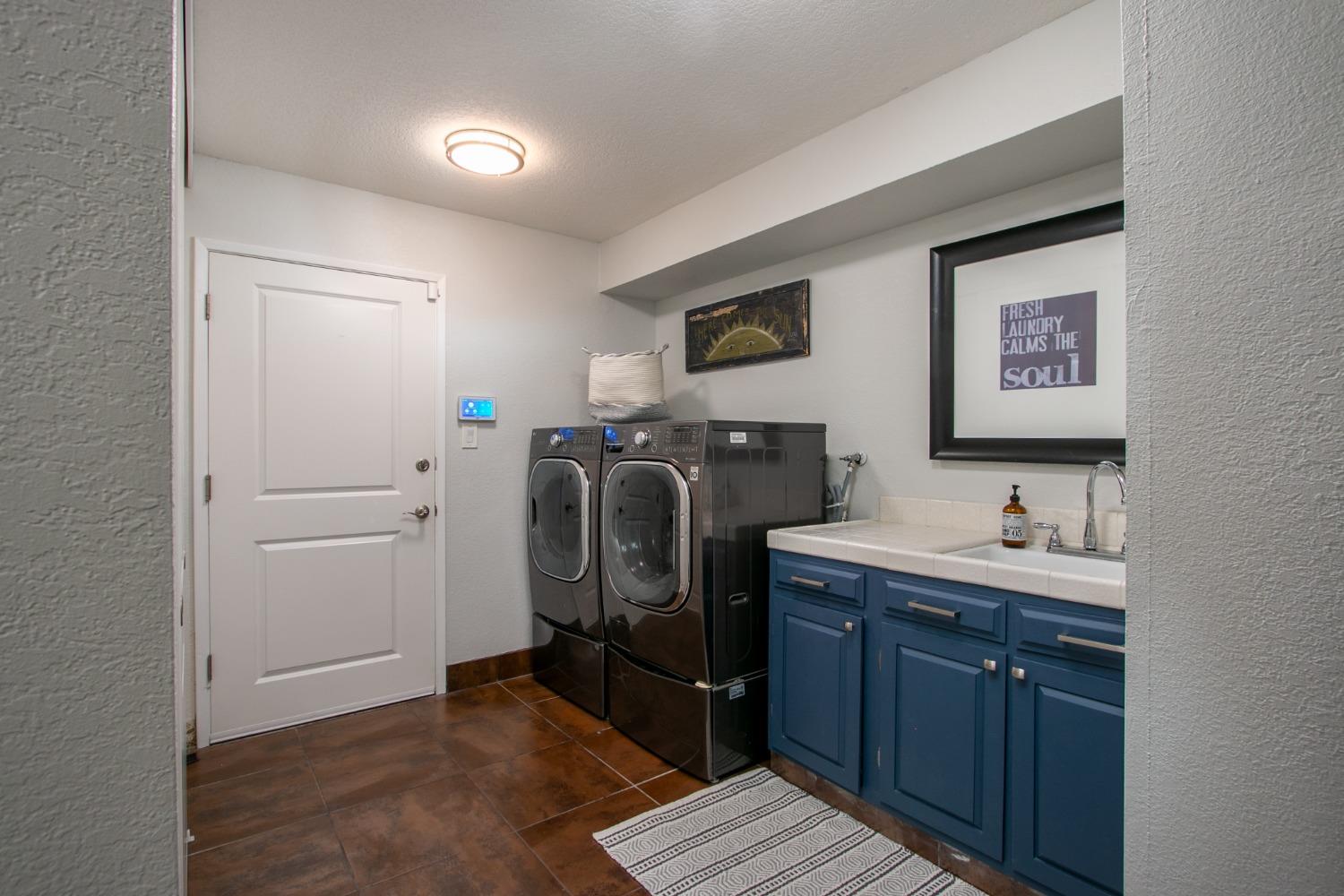 14975 Lago Drive Rancho Murieta, CA 95683 - Photo 27 of 41 a view of a storage and utility room in a house