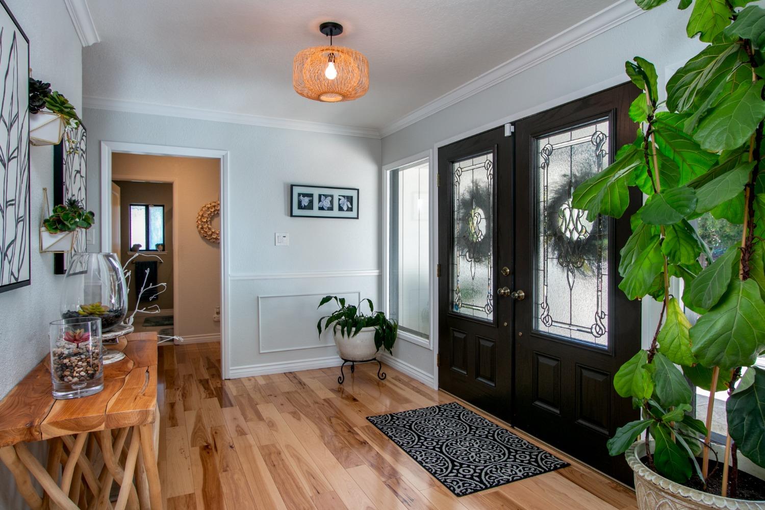 14975 Lago Drive Rancho Murieta, CA 95683 - Photo 3 of 41 a view of living room filled with furniture and a potted plant