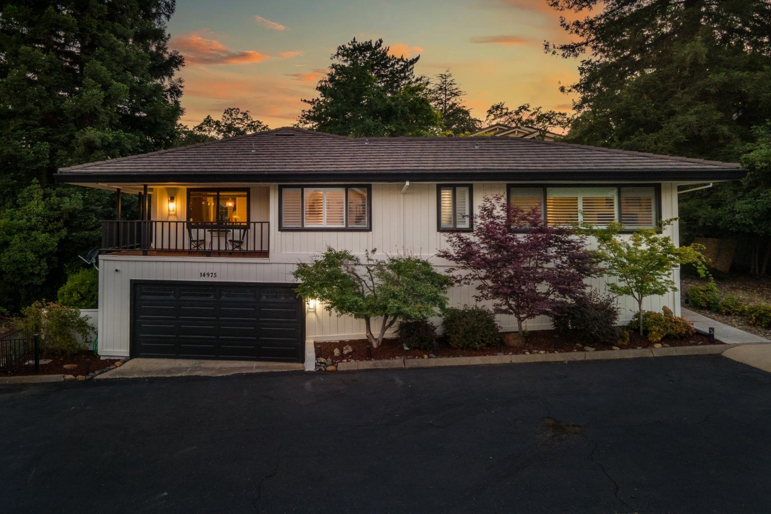 14975 Lago Drive Rancho Murieta, CA 95683 - Photo 32 of 41 a front view of a house with a garden