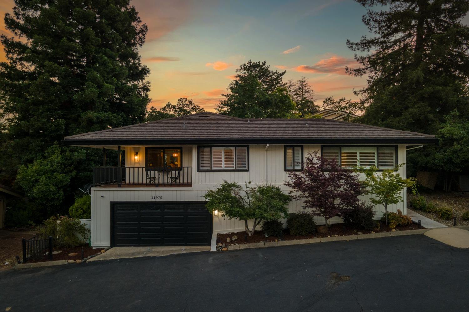 14975 Lago Drive Rancho Murieta, CA 95683 - Photo 39 of 41 a front view of a house with garden