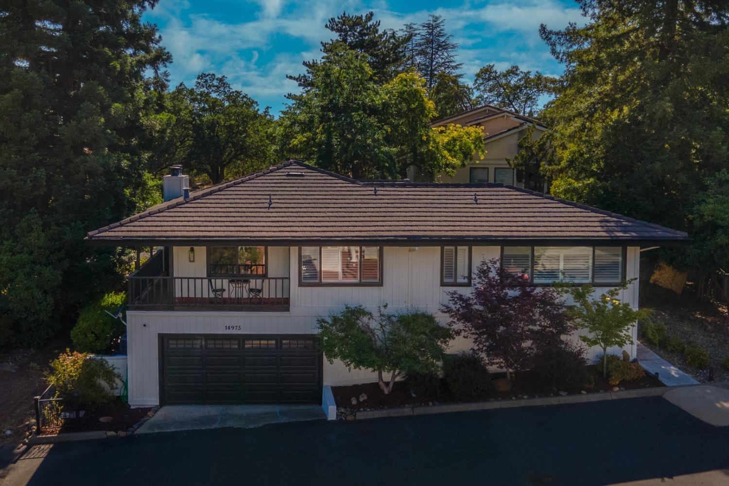 14975 Lago Drive Rancho Murieta, CA 95683 - Photo 41 of 41 a house with trees in front of it