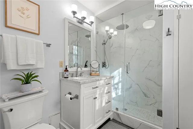 an aerial view of a house with outdoor space