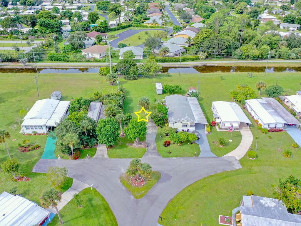9 St Tropez Drive Naples, FL 34112 - Photo 2 of 10 an aerial view of a house