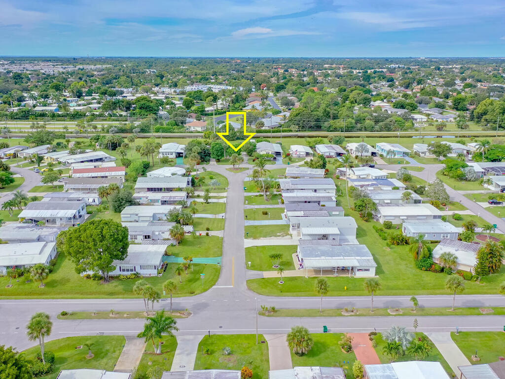 9 St Tropez Drive Naples, FL 34112 - Photo 3 of 10 an aerial view of a city