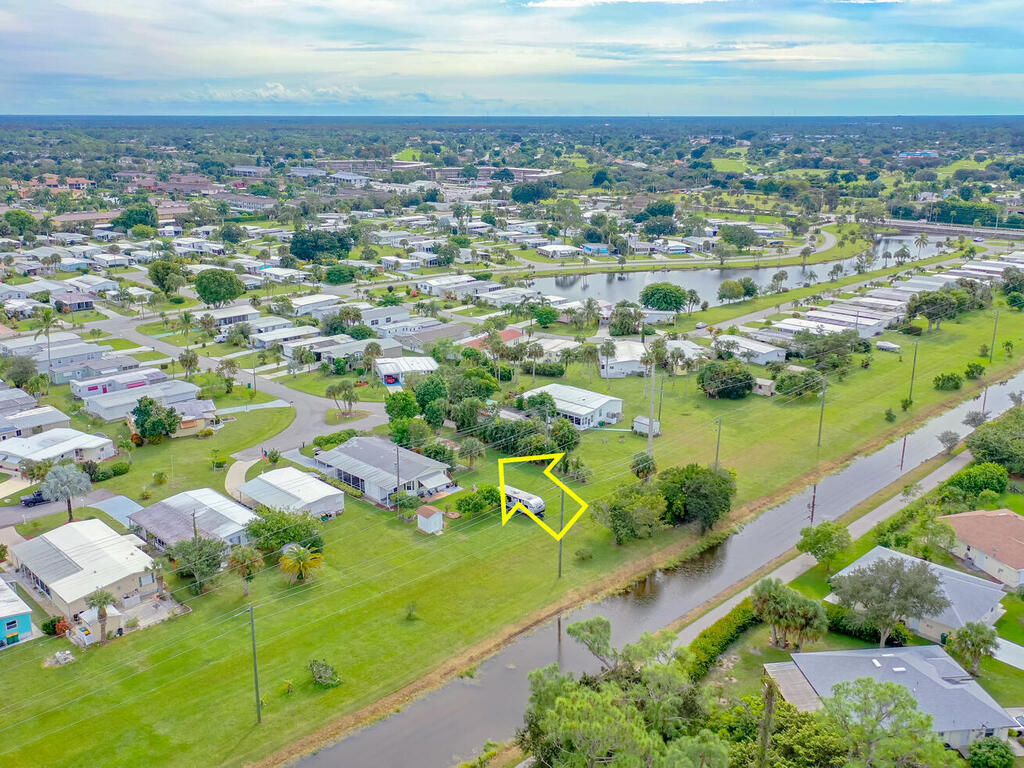 9 St Tropez Drive Naples, FL 34112 - Photo 8 of 10 an aerial view of residential houses with outdoor space