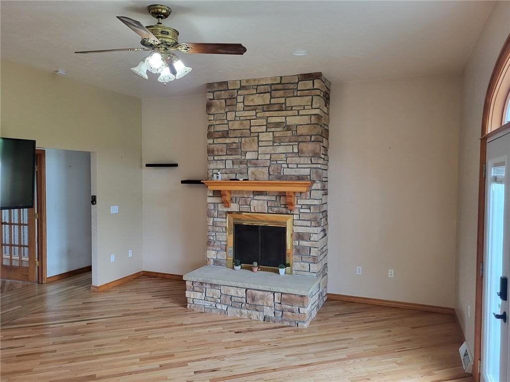 56 Lanik Road Bentleyville, PA 15314 - Photo 20 of 50 a view of an empty room with wooden floor fireplace and a window