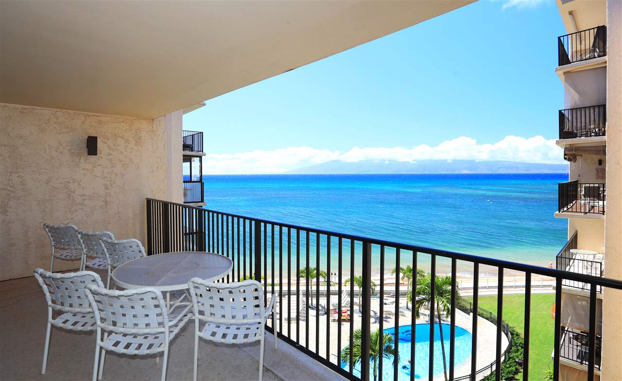 4401 Lower Honoapiilani Road, Unit B501 Lahaina, HI 96761 - Photo 2 of 14 a view of a chair and table in the balcony
