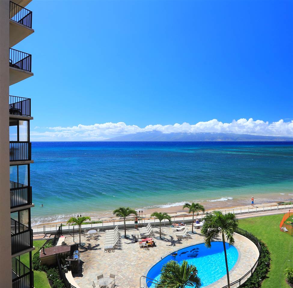 4401 Lower Honoapiilani Road, Unit B501 Lahaina, HI 96761 - Photo 3 of 14 a view of a swimming pool with an ocean view