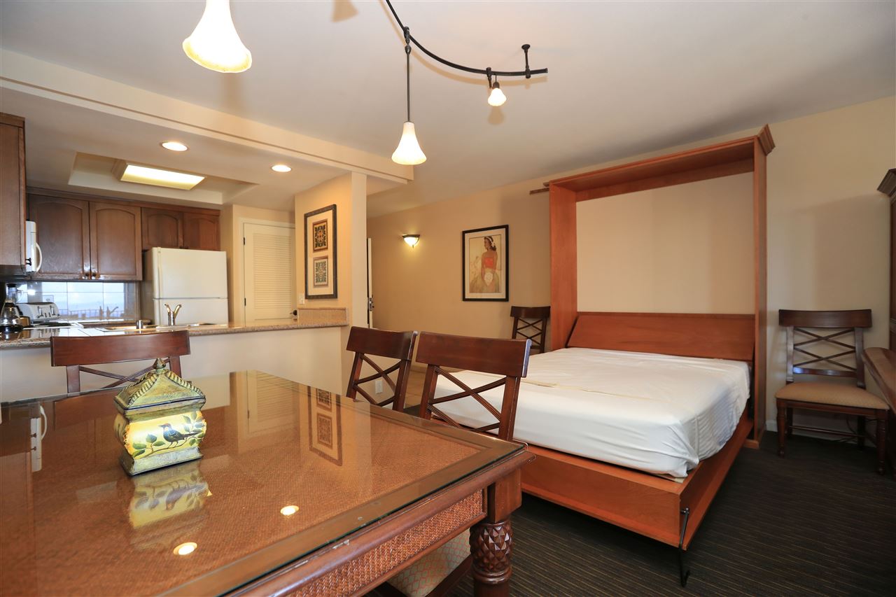 4401 Lower Honoapiilani Road, Unit B501 Lahaina, HI 96761 - Photo 7 of 14 a living room with furniture and a table