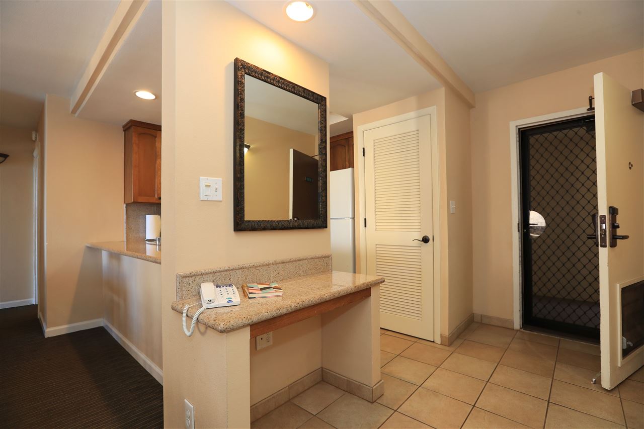 4401 Lower Honoapiilani Road, Unit B501 Lahaina, HI 96761 - Photo 9 of 14 a bathroom with a sink a mirror and a shower