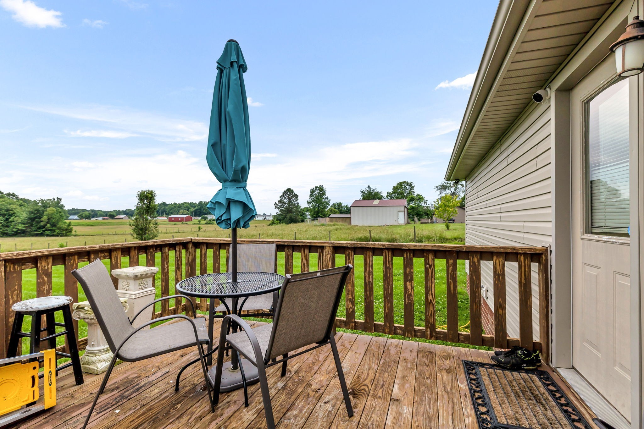 2164 Akersville Road Lafayette, TN 37083 - Photo 11 of 32 a view of a balcony with furniture
