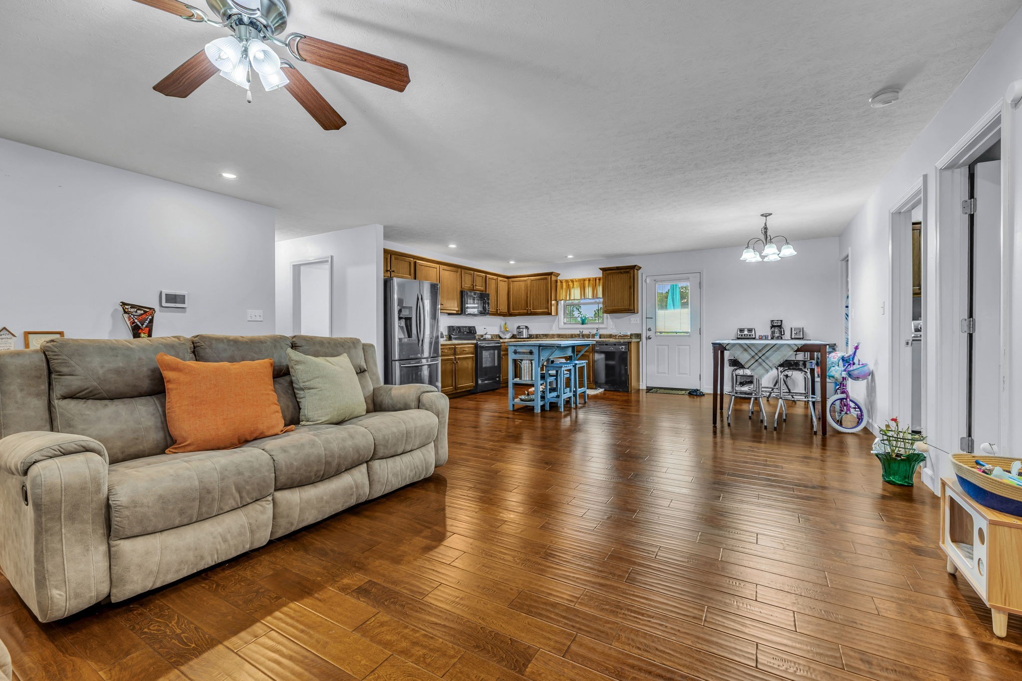2164 Akersville Road Lafayette, TN 37083 - Photo 16 of 32 a living room with furniture and wooden floor