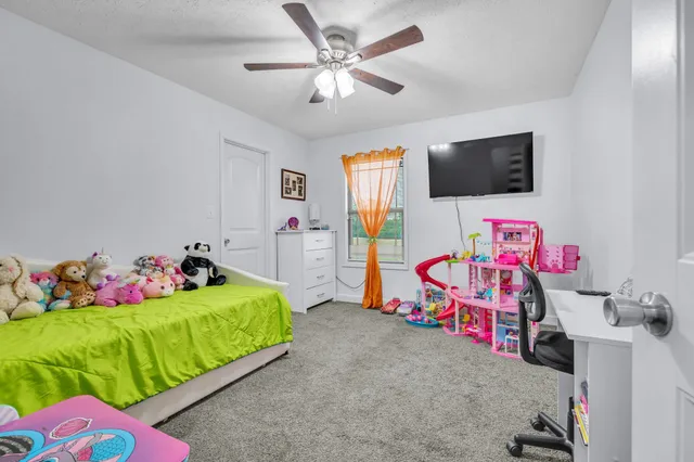 a view of a workspace with furniture