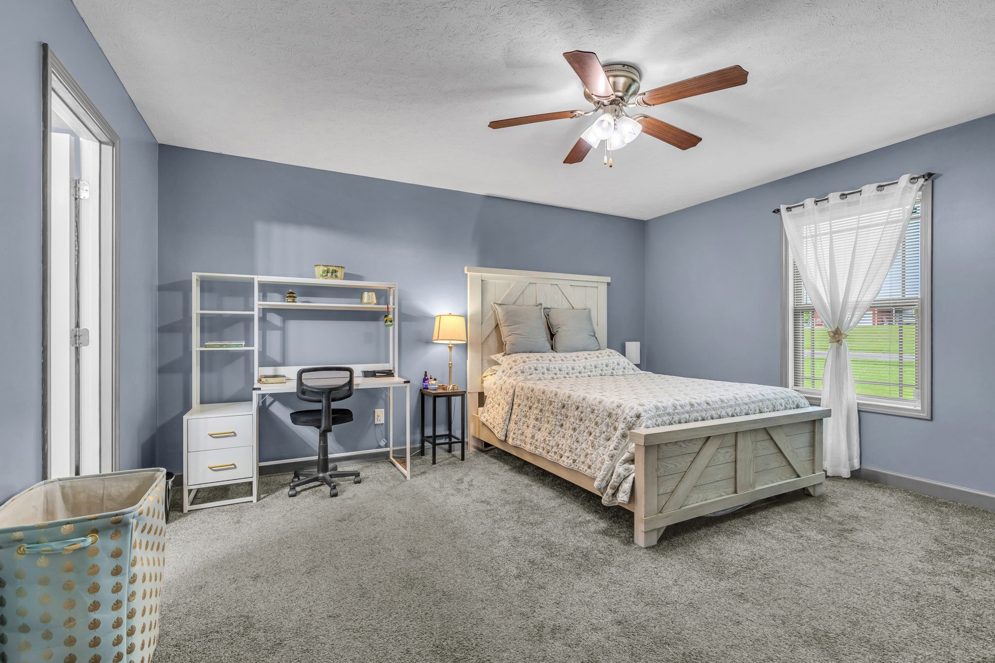 2164 Akersville Road Lafayette, TN 37083 - Photo 29 of 32 a bedroom with a bed and a window