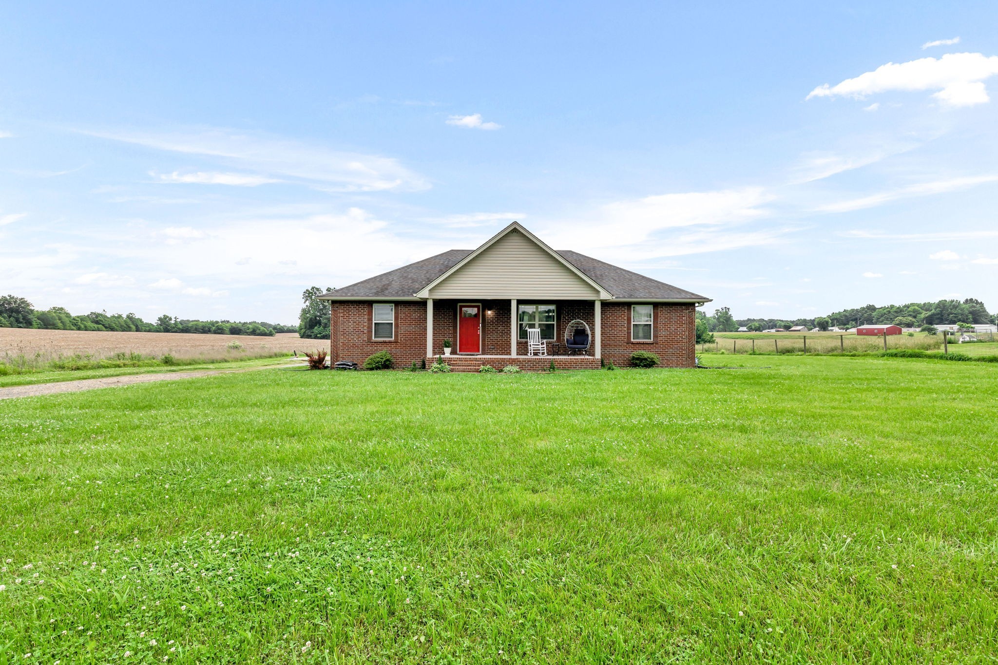 2164 Akersville Road Lafayette, TN 37083 - Photo 4 of 32 a view of a house with a big yard