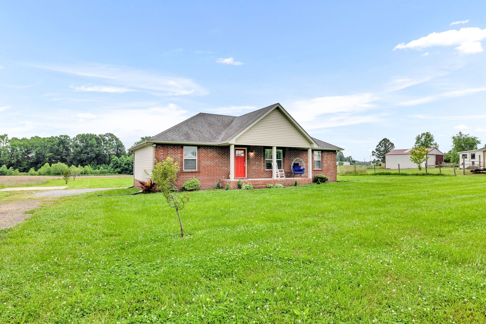 2164 Akersville Road Lafayette, TN 37083 - Photo 5 of 32 a view of an house with backyard space and balcony